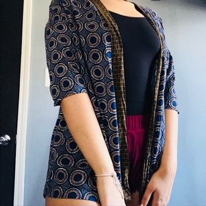Very unique patterned  medium sleeved cardigan